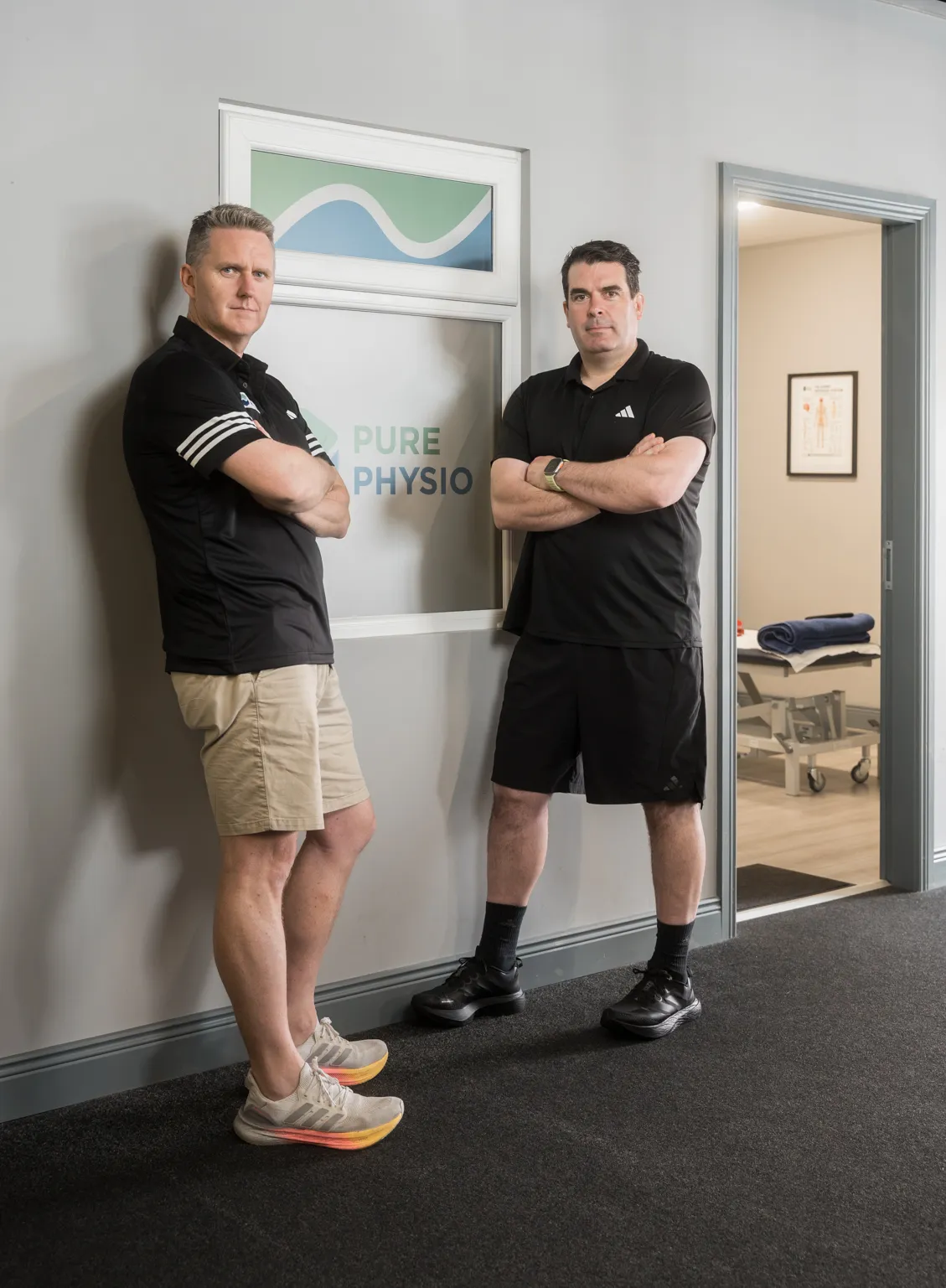 Damien Mordan and Declan Lynch at the Pure Physio clinic entrance